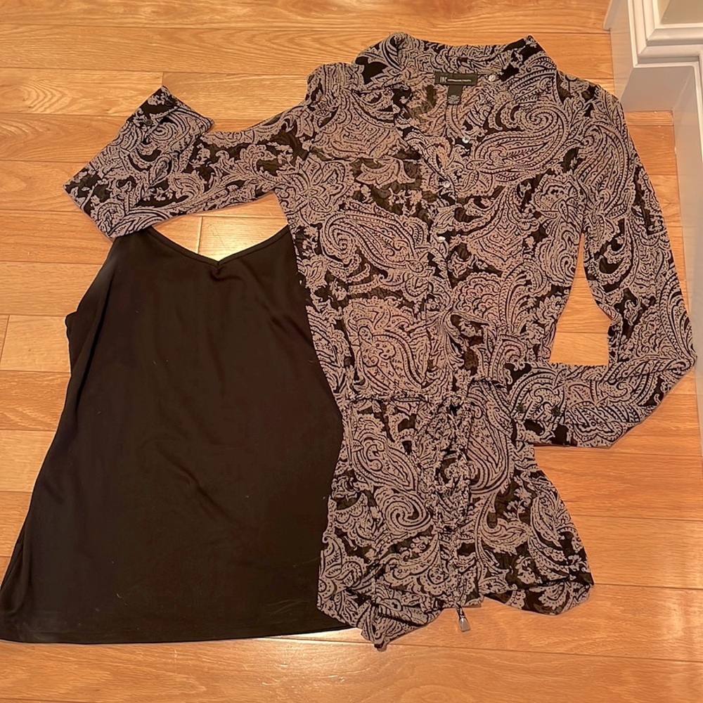 Two piece top. Black cammy and shear blouse with jeweled buttons .